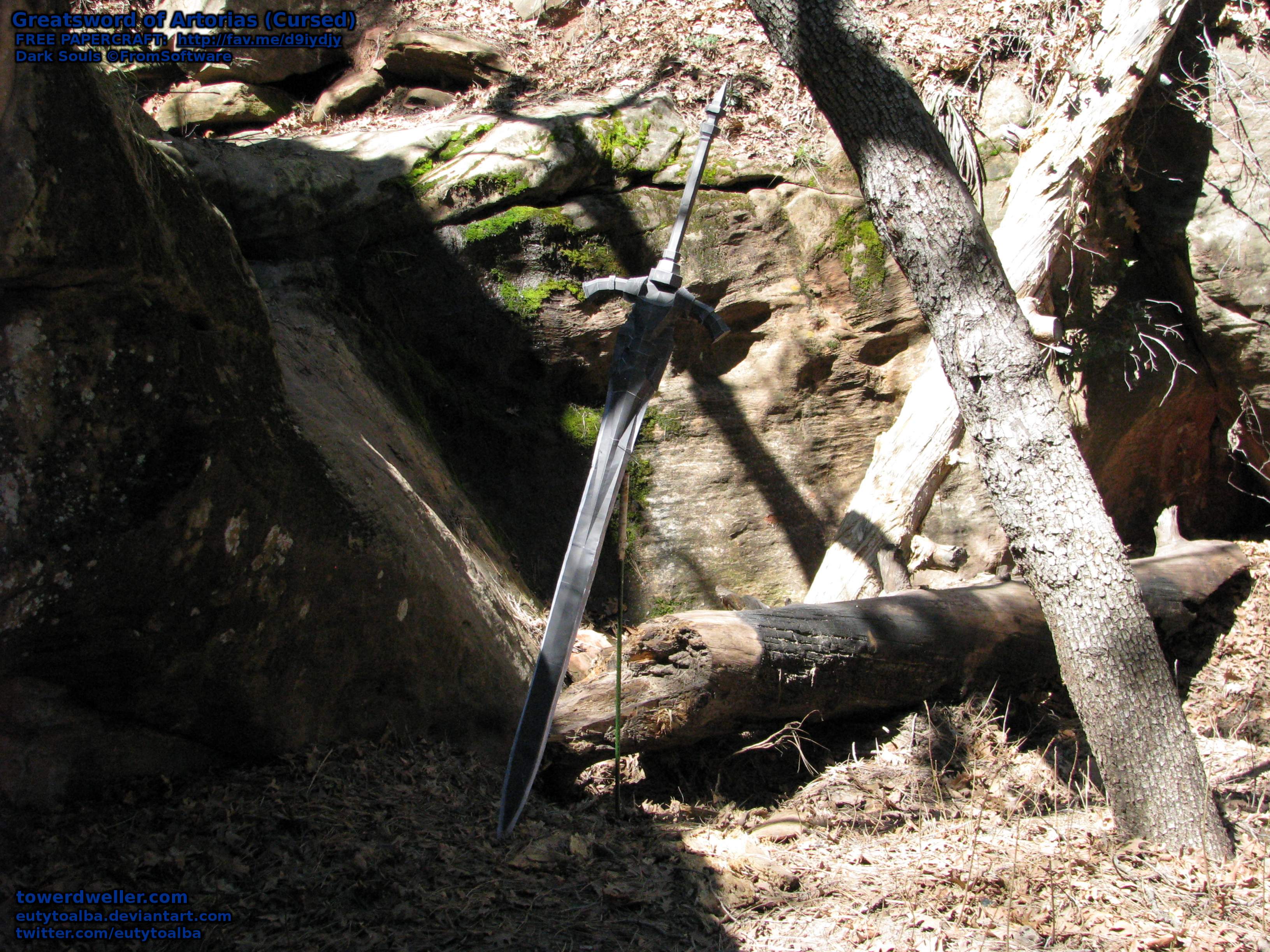 My meticulously scaled (accurately life-size!) Cursed Greatsword of Artorias papercraft, BEFORE fiberglass resin has been applied to it. In this pic, it's just "110lb" paper + a lightweight steel tomato plant stake, and probably still weighed under 1.5lbs. as a whole. Pic taken near Sedona, Arizona, USA, during a recent road trip.