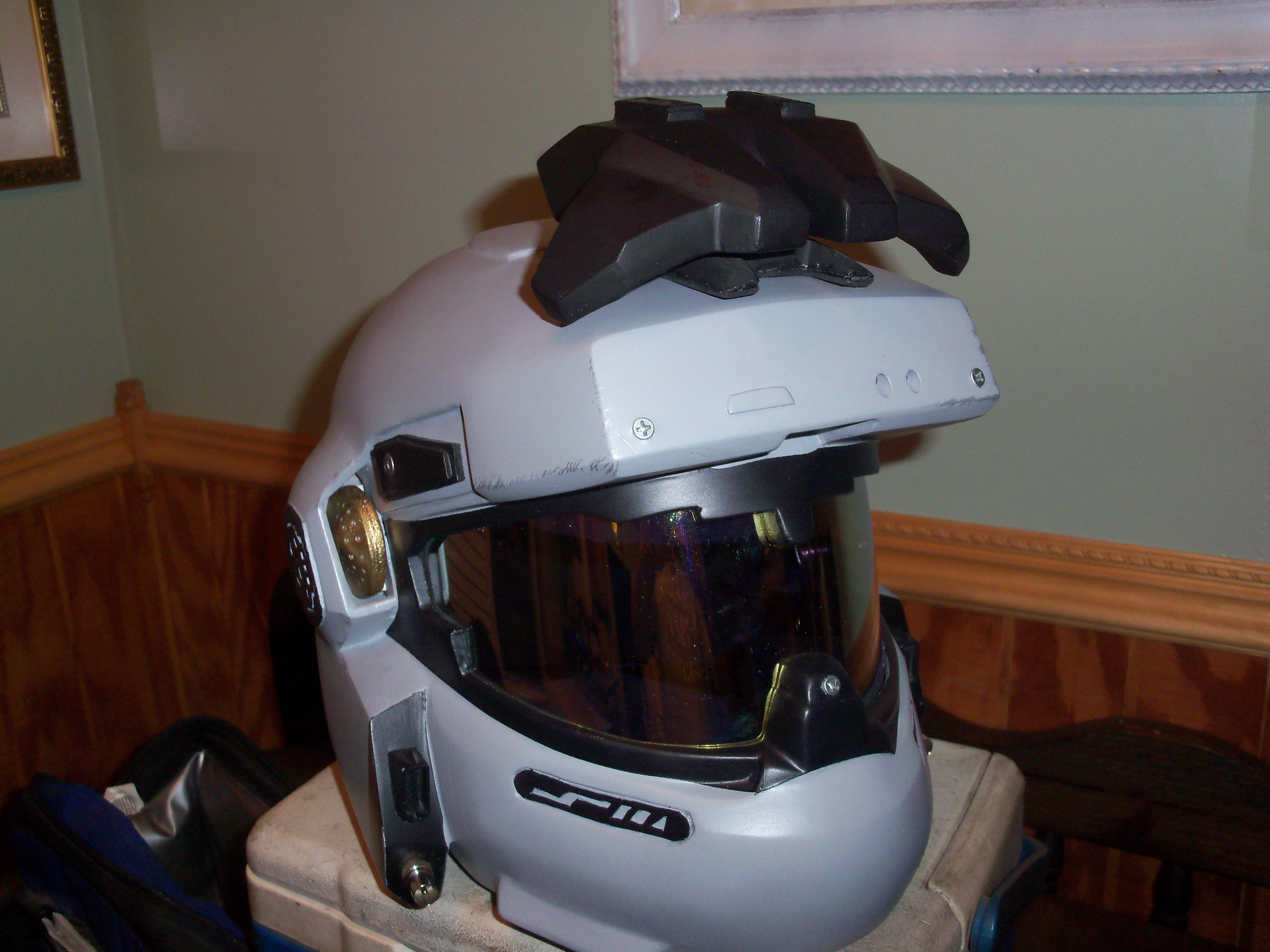 the attachment has a rare earth magnet in the base, and another one inside the helmet